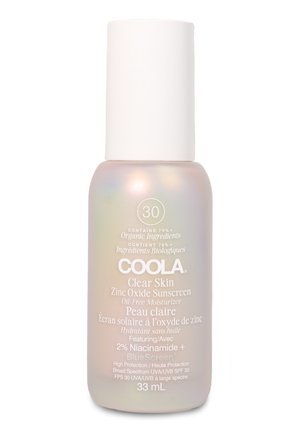 Sonnencremeflasche mit der Aufschrift Coola Clear Skin Zinc Oxide LSF 30, ölfreier Feuchtigkeitsbalsam mit 2 % Niacinamid, 33 ml, biologische Inhaltsstoffe, Breitbandschutz.