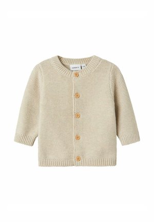 Cardigan lavorato a maglia beige con collo rotondo, maniche lunghe e chiusura con bottone in legno. Motivo testurizzato con polsini e orlo a costine.