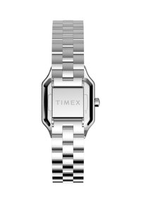 Sidabrinis nerūdijančio plieno laikrodis su stačiakampiu korpusu, poliruotu paviršiumi ir susietu apyrankės dizainu. Ant nugarėlės matomas prekės ženklas „TIMEX“.