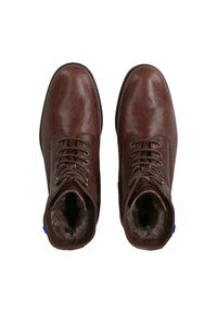 Bottines en cuir marron avec une finition lisse, à lacets et doublure en fausse fourrure à l'intérieur. Présentent des semelles durables et des œillets.
