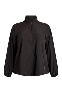 Schwarze Zip-up-Jacke mit hohem Kragen, elastischen Bündchen, legerer Passform und Einsatzdetails vorne und an den Seiten.