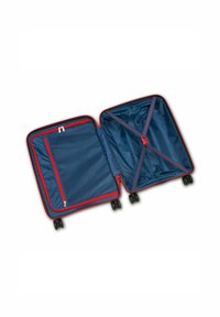 Navy suitcase with red accents, featuring a spacious interior, zippered pockets, and a cross strap design for secure packing. Four wheels included.