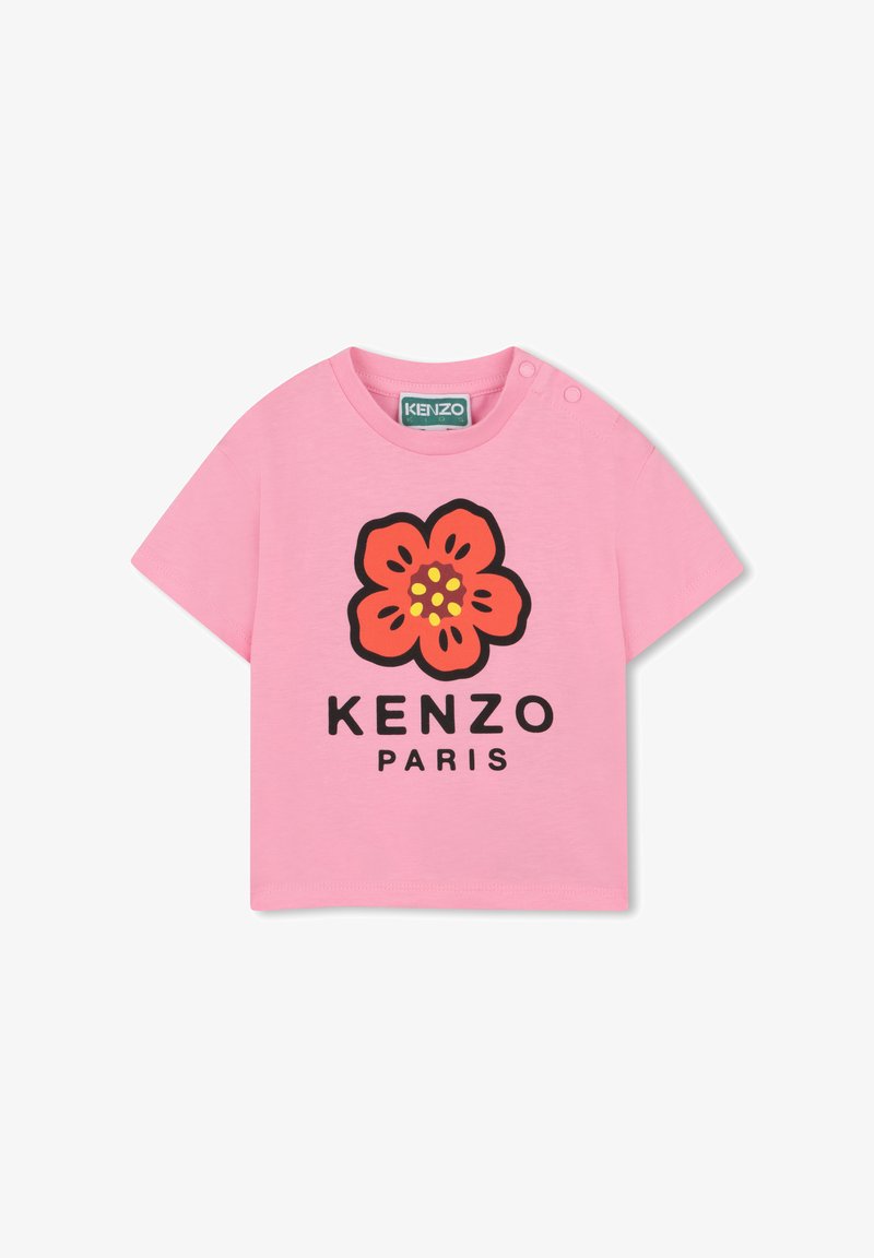 Roze peuter-T-shirt met een grote oranje bloemopdruk en de tekst "KENZO PARIS" aan de voorkant, met drukknoopjes op de schouder.
