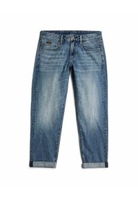 Jeans de mezclilla de color azul claro con corte relajado, que presentan un acabado ligeramente desgastado, puños enrollados y un diseño estándar de cinco bolsillos.