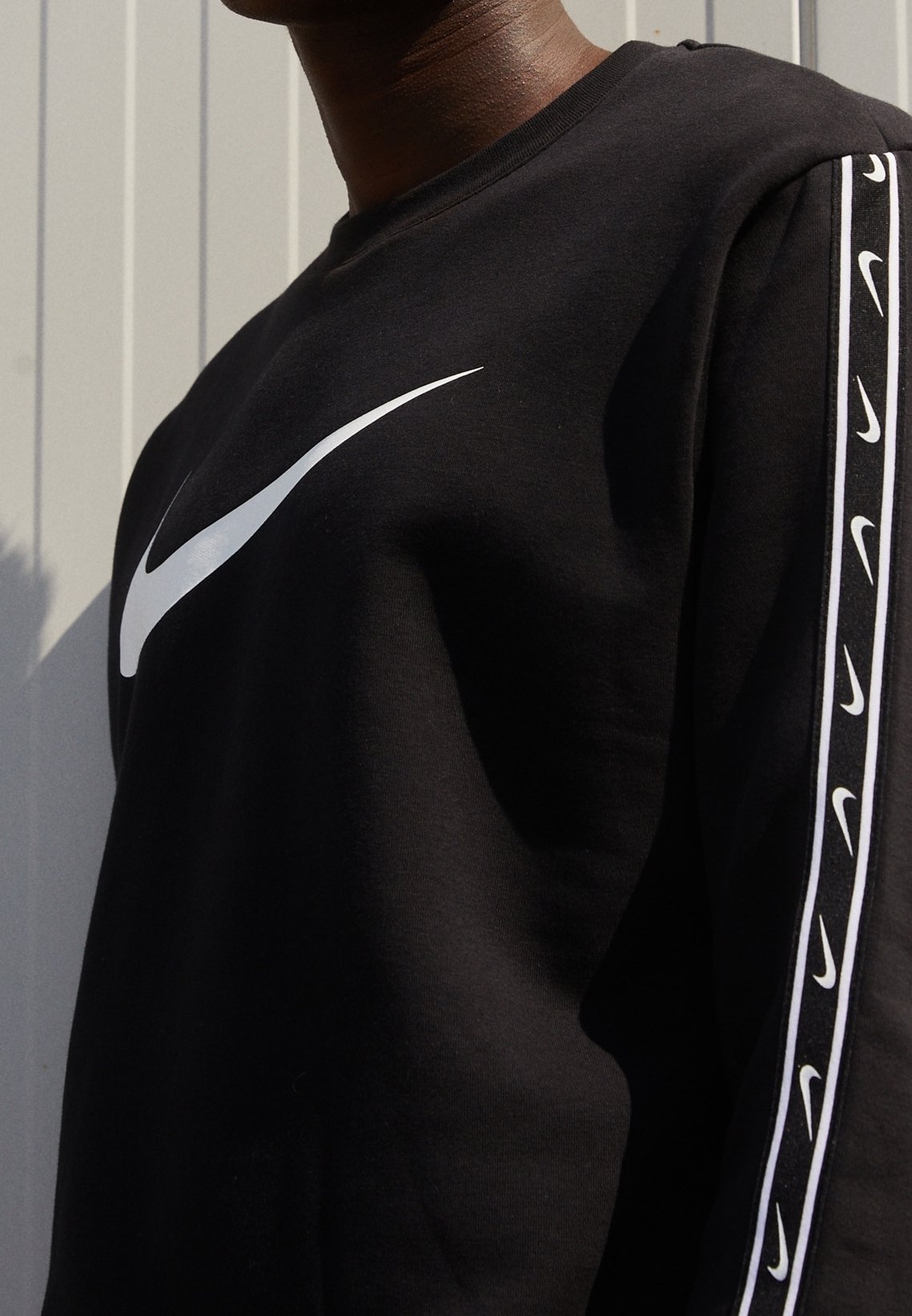 nike repeat pack logo taping polyknit hoodie in black