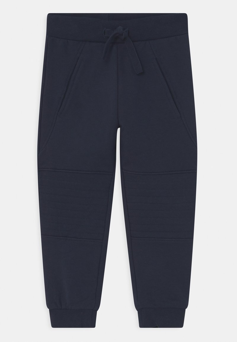 Pantalon de jogging bleu marine avec taille et poignets côtelés, fermeture par cordon de serrage, poches latérales et détails cousus au niveau des genoux.