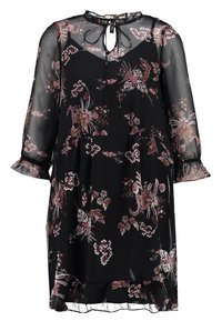 Robe fleurie noire en tissu léger et transparent. Caractérisée par un col noué, des manches longues avec des volants, et une coupe ample avec des motifs floraux roses et blancs.