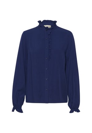 Marineblauwe blouse met een rimpelboord en een knoopsluiting aan de voorkant. Lange mouwen met gatherings aan de manchet. Gemaakt van een gladde, lichte stof.