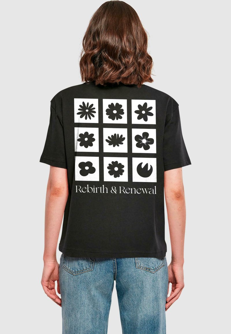 Black cotton t-shirt featuring a grid of nine flower designs in black on the back, with the text "Rebirth & Renewal" below.