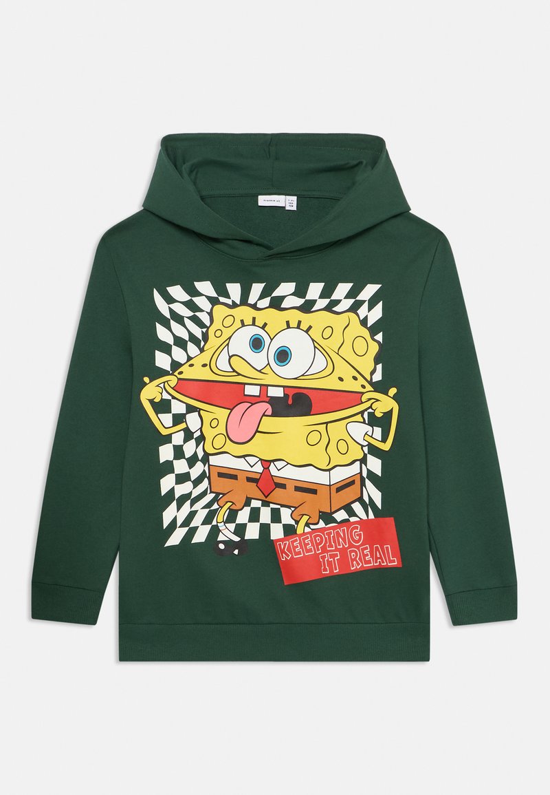 Sweatshirt à capuche vert avec un personnage de dessin animé sur un fond checkered, accompagné du texte "GARDER LA VRAIE" en rouge. Matériau en coton.