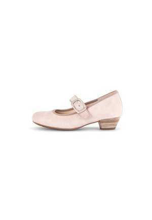 Light pink suede Mary Jane shoes with a rounded toe and a small stacked heel. Features a strap with a rectangular buckle.