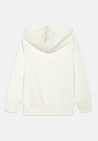 Světlý krémový mikina s klokaní kapsou, stahovací kapucí, žebrovanými manžetami a pasem. Měkká tkanina a minimální švy pro čistý design.