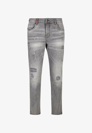 Hallitus hallid denim püksid, millel on kulunud kujundus, sealhulgas rebendite ja värvilaikude detailid. Tavaline viie taskuga stiil ja kitsenev lõige.