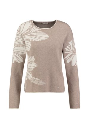 Suéter beige con estampado floral blanco, mangas largas, escote redondo y un detalle delicado cerca del dobladillo. Textura de punto suave, diseño informal.