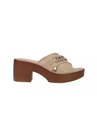 Sandalo beige slip-on con nastro largo caratterizzato da un dettaglio ad anello. Tacco a blocco e soletta imbottita con una texture liscia.