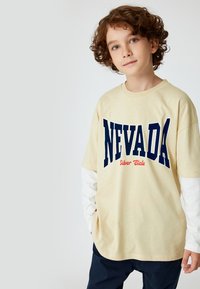 Koton VARSITY - Langærmet T-shirt - beige