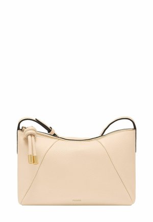 Sac à bandoulière en cuir beige avec fermeture éclair, détail de pompon noué et logo Fossil discret au centre en bas.