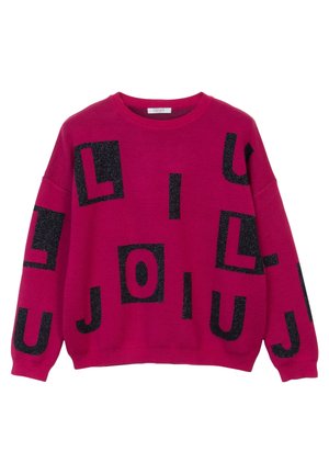 Bright pink sweater with black glittery block letters scattered across the front and sleeves in a casual, loose fit design.