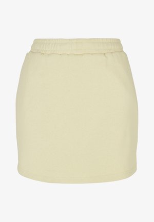 Jupe jaune clair en tissu doux, dotée d'une taille élastique et d'une coupe droite. Texture lisse sans motifs ni accents visibles.
