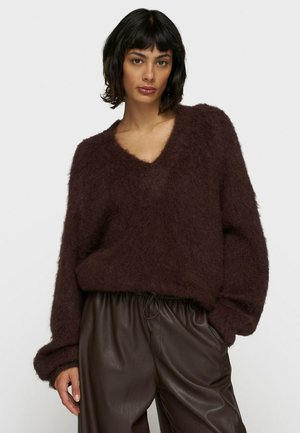 - Sweter