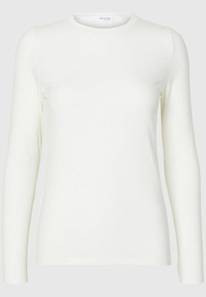 Pitkähiha valkoinen paita, joka on valmistettu pehmeästä kankaasta. Paidan kauluksessa on pyöreä pääntie, ja se on sileä tekstuuriltaan sekä kapea muotoilultaan. Ei näkyviä kuvioita tai koristeita.