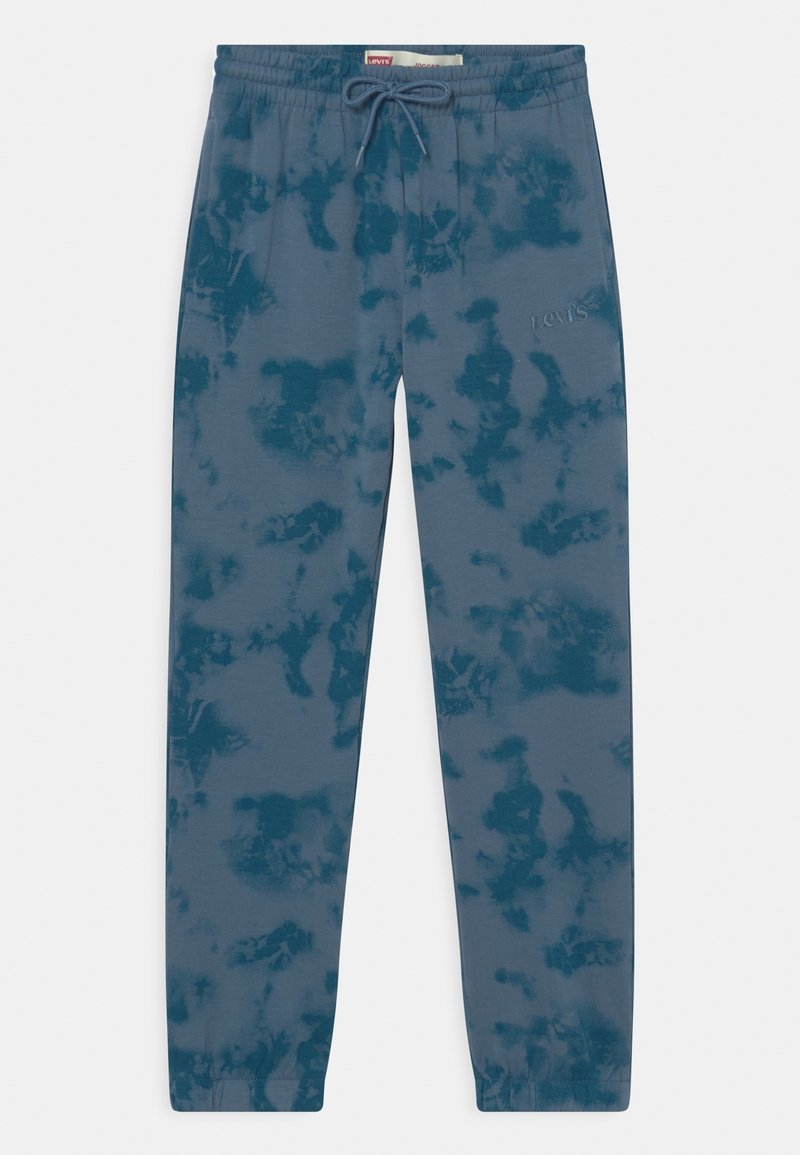 Niebieskie spodnie dresowe w stylu tie-dye z elastyczną talią i mankietami, wiązaniem na sznurek oraz subtelnym logo Levi’s na prawej udzie.