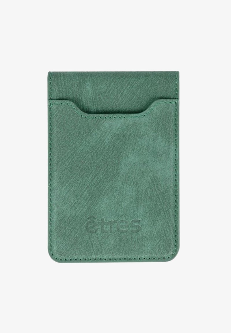 Green leather cardholder with a textured finish, featuring a top slot and embossed logo. Rounded edges and fine stitching detail.