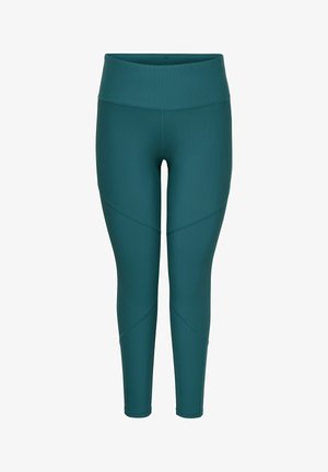 Teal leggings med høy midje, strukturert stoff og diagonale sømmer som detaljering, avsmalnende mot ankelen med en glatt finish.