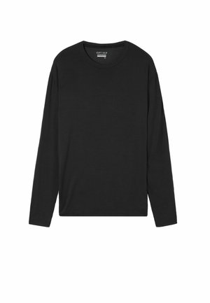 Camisa negra de manga larga hecha de suave material de seda, con un escote redondo y un corte relajado, con detalles de costura mínimos.