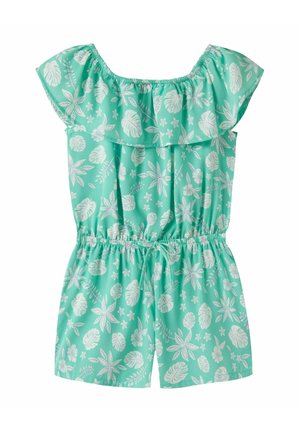 Combinaison verte aqua avec motifs de feuilles tropicales et de fleurs blanches, encolure à volant dénudée, taille élastique et cordon de serrage.