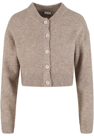 Kratka bež vestu od mekane pletene tkanine, s rebrastim rubom, zaobljenim ovratnikom i šest svijetlih gumba sprijeda.