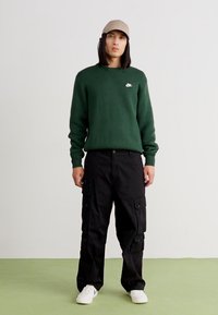 Carhartt WIP TRACKER PANT - Cargobukser - black