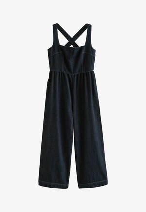 Jumpsuit in denim blu scuro con spalline incrociate, gambali larghi e vita elastica. Presenta cuciture in vista e due tasche laterali.