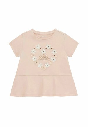 Vestito rosa chiaro a maniche corte per bambini piccoli con scollo rotondo, motivo floreale a forma di cuore e scritta "A Guess Love Story" sul petto.