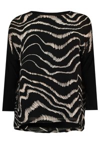 Svart långärmad topp med beige, vågiga zebraliknande ränder över framsidan och enfärgade svarta ärmar.