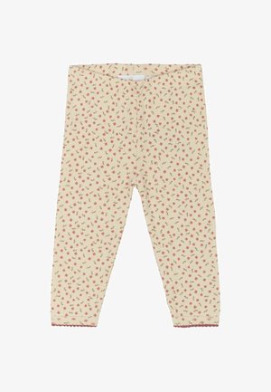 Krēmkrāsas legingi ar ziedu rakstu rozā un zaļā krāsā, ar ribotas tekstūras un viļņotām apakšmalām pie potītēm.