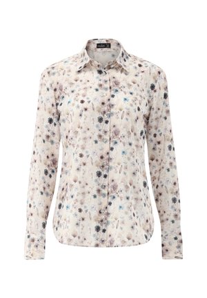 Camicia floreale a maniche lunghe con apertura frontale a bottoni, tessuto morbido e base beige chiaro con motivi di fiori in blu e viola pastello.