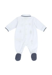 Pelele de bebé de algodón blanco con mangas largas, ribete en azul marino y diseño con pies. Presenta un patrón texturizado y un cuello clásico con solapa.