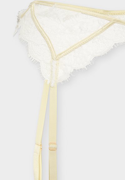 Λευκή δαντελένια ζώνη ζαρτιέρας με κρεμ σατέν περιθώριο και ρυθμιζόμενους ιμάντες πάνω σε ανοιχτό φόντο.