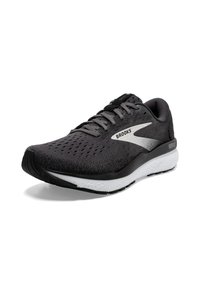 Scarpa da corsa nera con tomaia in mesh traspirante, suola intermedia bianca e dettagli testurizzati. Presenta un logo prominente e un design con lacci.