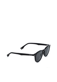 Lunettes de soleil Police noires avec verres foncés arrondis et branches épaisses noires, présentées sur fond blanc.