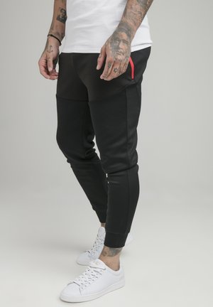 COVERT FUNCTION PANTS - Spodnie treningowe - black/red