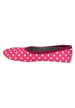 Pink ballerina flat with white heart pattern, fabric upper, round toe, and a contrasting dark pink trim at the opening. Flat sole.