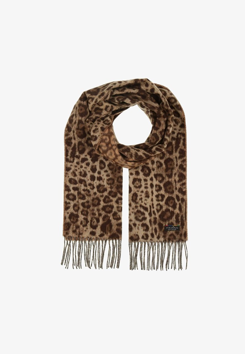 Écharpe imprimé léopard marron et beige avec des extrémités à franges, pliée en boucle, étiquetée avec une petite étiquette de marque noire.