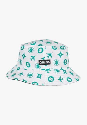 Hattu ämpäri valkoisesta kankaasta, jossa on toistuva teal-väriinen kuvio dollarimerkeistä, lentokoneista ja muodoista, mustalla logotarralla.