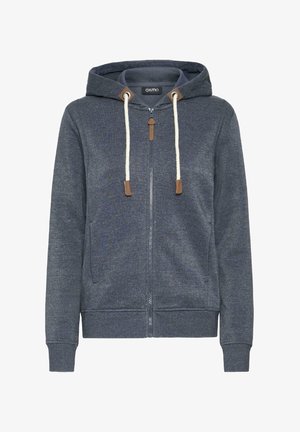 Tumši zilas krēms ar kapuci, izgatavots no mīksta kokvilnas maisījuma. Aprīkots ar auklām, ādas akcentiem un ribinātiem piedurkņu galiem un apakša.