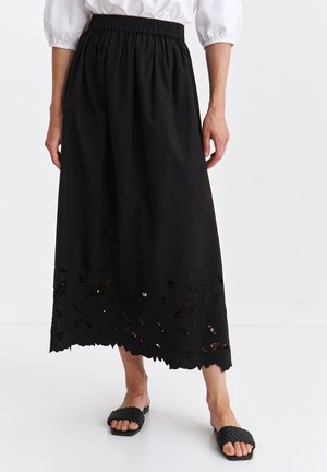 - Spódnica trapezowa