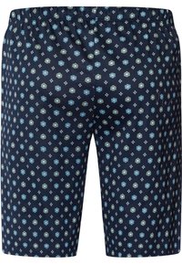 Marina blå shorts med ett blom- och diamantsmönster i blått och gult. Elastisk midja och mjuk, lätt tyg.