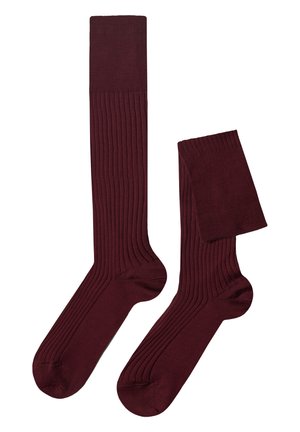 Burgundy ribbed knee-high socks with a solid cuff, featuring a smooth texture and a rounded toe design. Includes one pair.