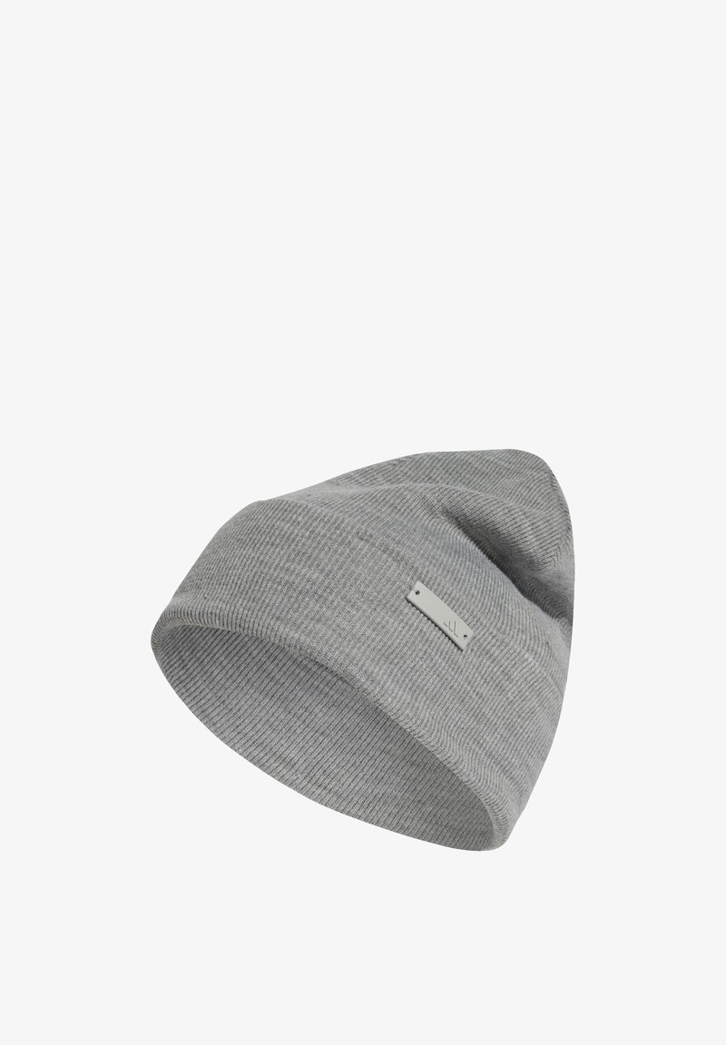 Gray knit beanie with a textured pattern. Features a small, rectangular brand tag sewn on the side. Soft, flexible fabric.